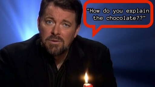 A image of Jonathan Frakes with an edited red speech bubble that says “How do you explain the chocolate?”